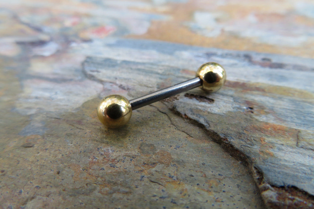 What material to choose [gold / titanium ASTM -F136] - Obsidian piercing
