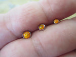 Orange Fire Opal Piercing